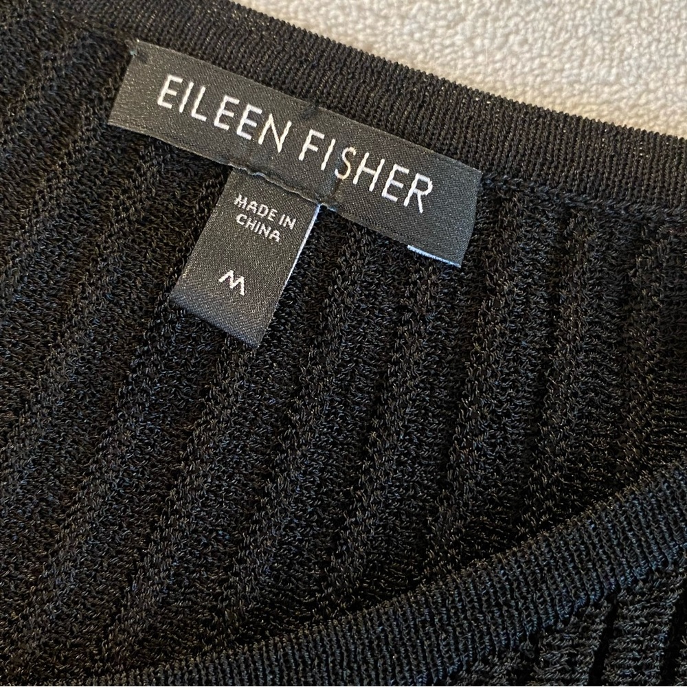 Eileen Fisher size medium, black dress, with separate lining. stretchy to move.